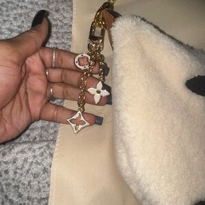 Elegant Cream Shoulder Bag with Gold Accents